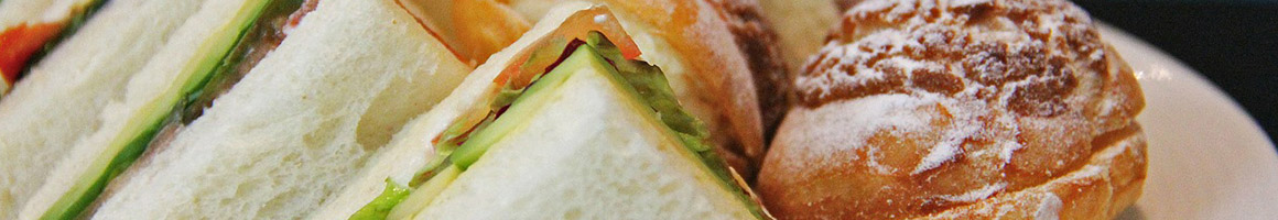 Eating Sandwich at Shirley's Bagels restaurant in Newport Beach, CA.